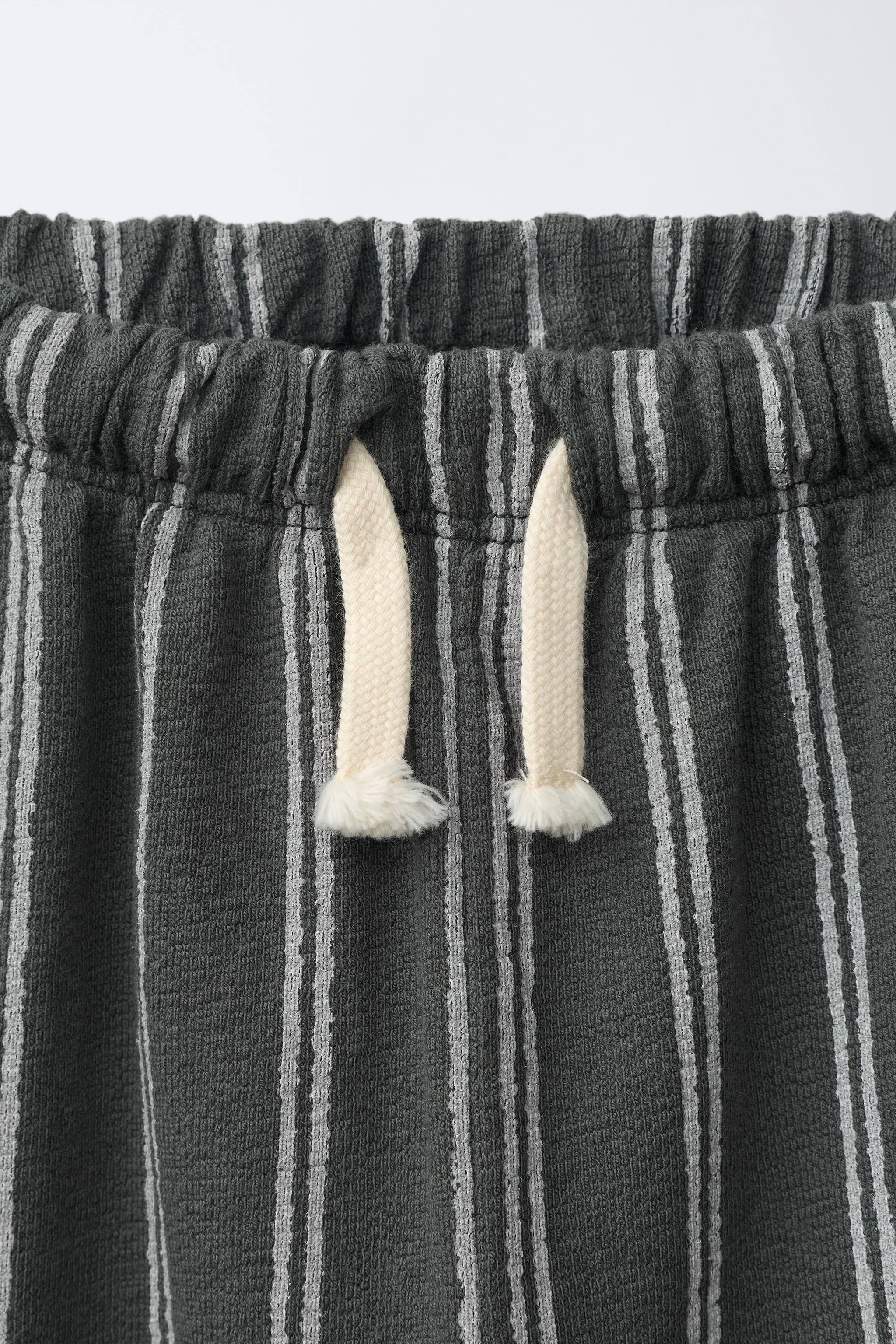 STRIPED RELAXED PANTS